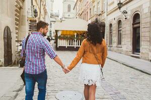 young couple in love traveling, vintage style, europe vacation photo