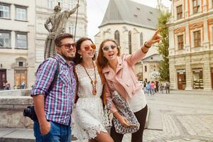 young hipster company of friends traveling, vintage style, europe vacation photo
