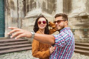 young couple in love traveling, vintage style, europe vacation photo