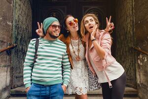 young hipster company of friends traveling, vintage style, europe vacation photo