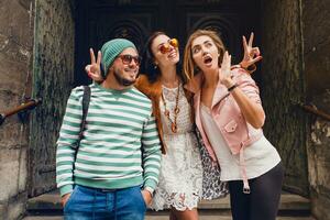 young hipster company of friends traveling, vintage style, europe vacation photo