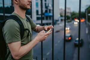 handsome hipster man walking in street photo