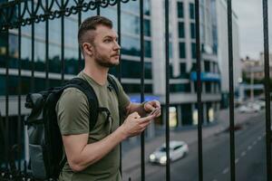 handsome hipster man walking in street photo