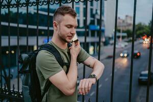 handsome hipster man walking in street photo