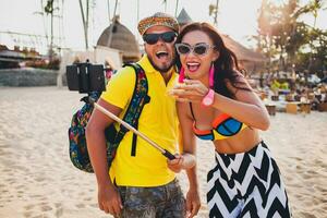 young hipster beautiful couple in love, stylish summer outfit photo