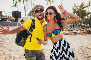 young hipster beautiful couple in love, stylish summer outfit photo