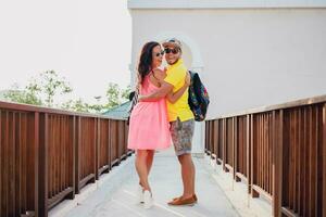 young hipster beautiful couple in love, stylish summer outfit photo