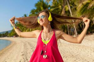 young hipster beautiful woman, tropical beach photo