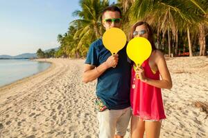 young hipster couple in love, tropical beach photo