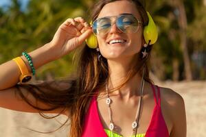 young hipster beautiful woman, tropical beach photo