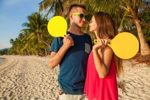 young hipster couple in love, tropical beach photo