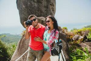 young happy hipster couple in love traveling around world photo