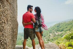 young happy hipster couple in love traveling around world photo