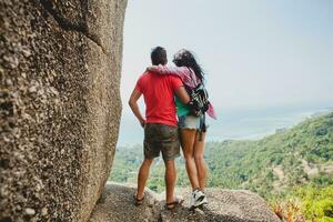 young happy hipster couple in love traveling around world photo