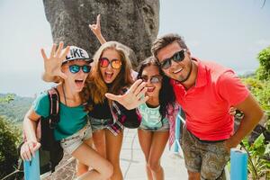 happy hipster company of friends traveling around world photo