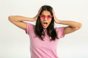 attractive woman in pink t-shirt and sunglasses photo