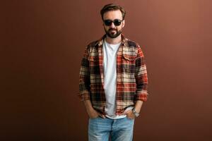 handsome man on brown background photo