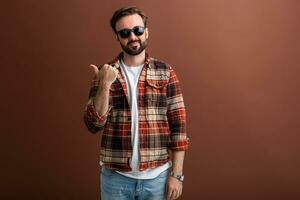 handsome man on brown background photo