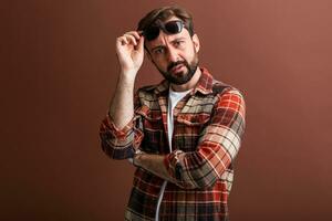 handsome man on brown background photo