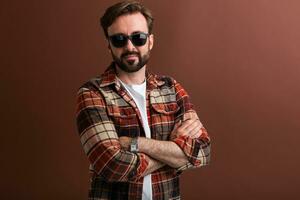 handsome man on brown background photo