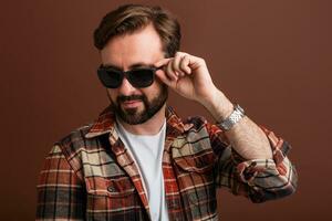 handsome man on brown background photo