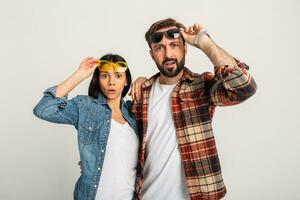stylish man and woman in casual denim hipster outfit having fun photo