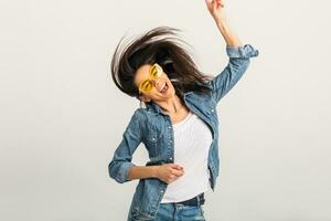 attractive smiling happy woman dancing waving long hair photo