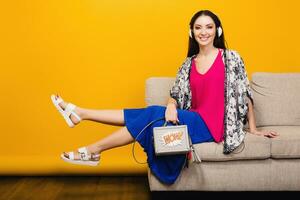 woman posing with stylish footwear summer fashion and bag photo