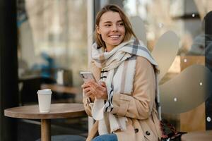 stylish woman walking in winter street photo