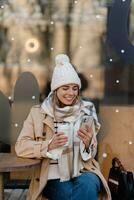 stylish woman walking in winter street photo