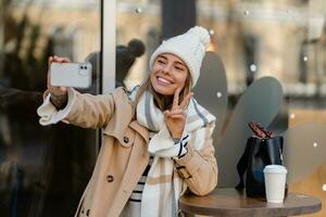 stylish woman walking in winter street photo