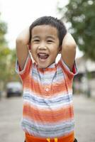 close up head of asian children happiness emotion photo