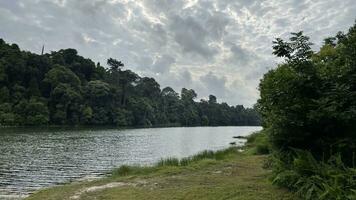 Reflections of Morning panorama of lake in the Lake District in Singapore resovoir photo