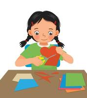 Cute little girl cutting colored paper with scissors making heart shape paper cut art craft vector