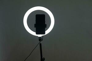 Ring Light is used to illuminate your content. photo