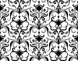 Wallpaper in the style of Baroque. Seamless White and black floral ornament. Graphic pattern for fabric, wallpaper, packaging. Ornate Damask flower ornament vector