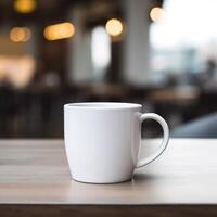 a white cup sitting on top of a table in white background photo
