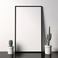 a picture frame and a cactus in a pot photo