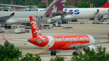 PHUKET, THAILAND DECEMBER 5, 2016 - AirAsia Airbus 320 HS BBP taxiing after landing, Phuket International airport video