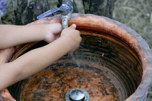 Children's hands. Wash your hands to prevent germs. photo