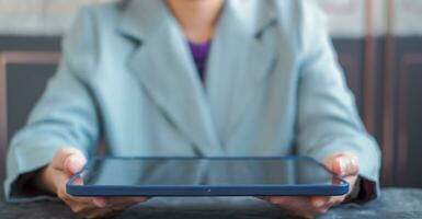 Woman typing work on laptop Suitable for making infographics. photo