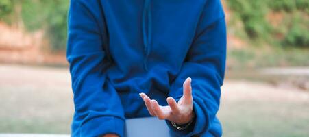 Woman's hands supporting something on a notebook Suitable for making infographics. photo