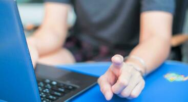 woman pointing finger and working with notebook Suitable for making infographics. photo