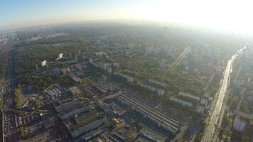 Flying over the city district on sunny day video