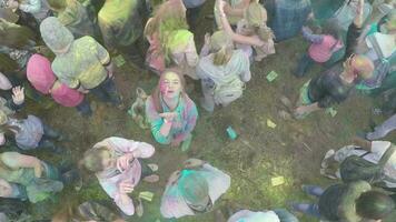 Happy people on Colours Festival, aerial shot video