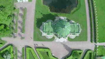 Flying over ancient building and pond in Tsaritsyno video