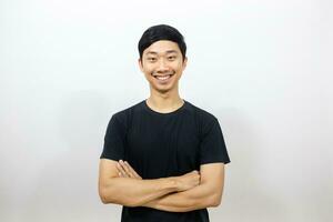 Positive asian man black shirt smile and cross arm isolated photo