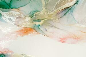 Painting created with alcohol ink. Soft smooth color transitions combined with clear gold and silver edges. Blue, pink, green abstract color combination. photo