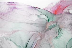 Painting created with alcohol ink. Soft smooth color transitions combined with clear gold and silver edges. Blue, pink, green abstract color combination. photo