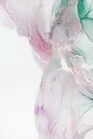 Painting created with alcohol ink. Soft smooth color transitions combined with clear gold and silver edges. Blue, pink, green abstract color combination. photo